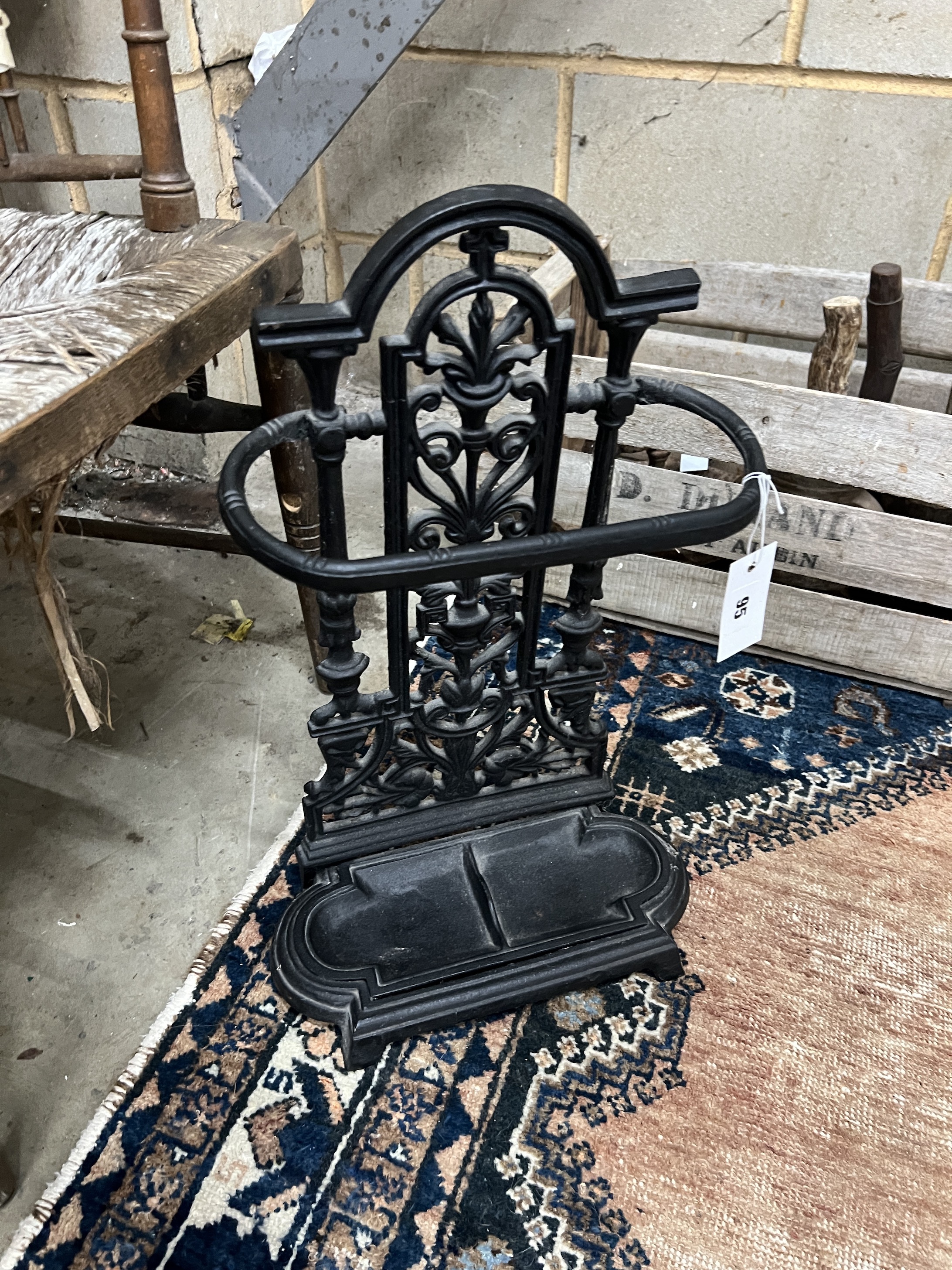 A small Victorian style cast iron stickstand, height 52cm
